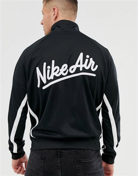 nike schwarze trainingsjacke mit kontrastierenden streifen und logo|Schwarze Nike Trainingsjacken für Herren online kaufen .